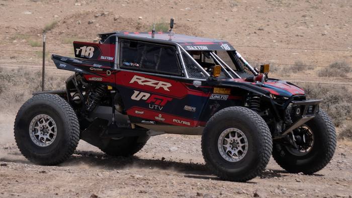 UTV Pro race vehicle number T18 at speed, Polaris RZR