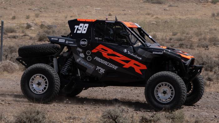 UTV Pro race vehicle number T98 at speed, Polaris RZR
