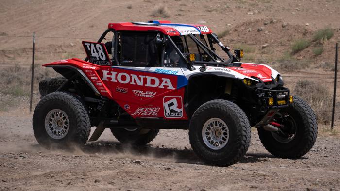 UTV Pro race vehicle number T48 at speed, Honda Talon Turbo