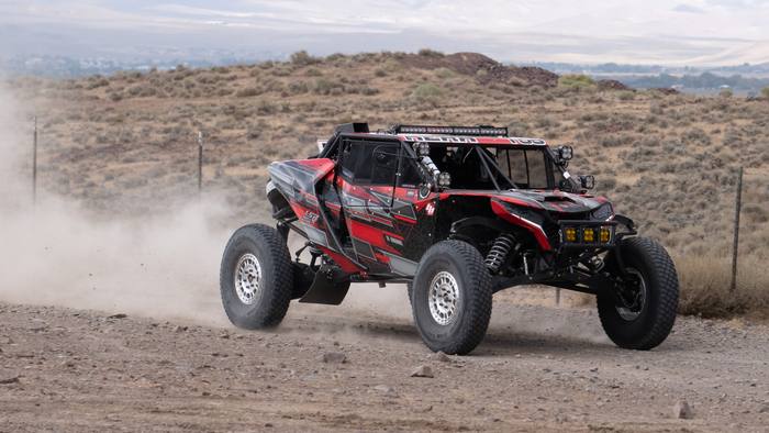 UTV Pro race vehicle at speed, Polaris RZR Pro R