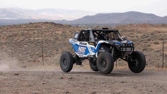 UTV Pro race vehicle number T52 at speed, Ronnie Anderson