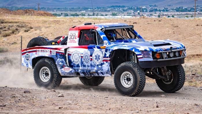 Unlimited Truck Legends race vehicle number L22 at speed, Robert Malone