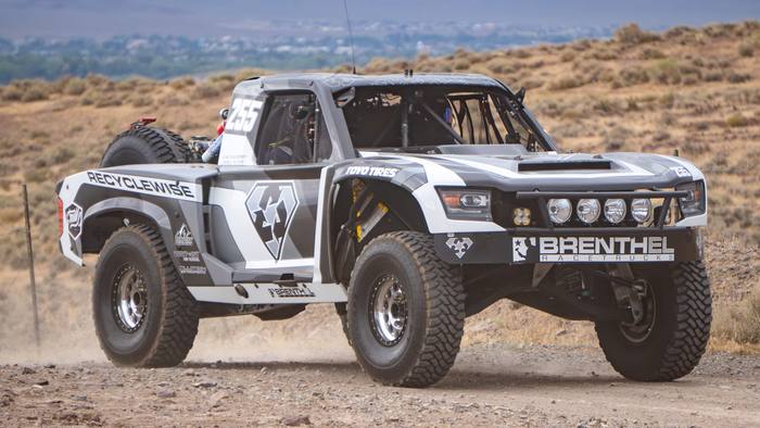 Unlimited Truck SPEC race vehicle number 255 at speed, Kirk Harkey