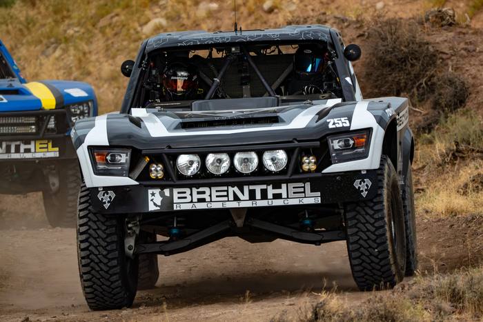 Unlimited Truck SPEC race vehicle number 255 at speed, Kirk Harkey