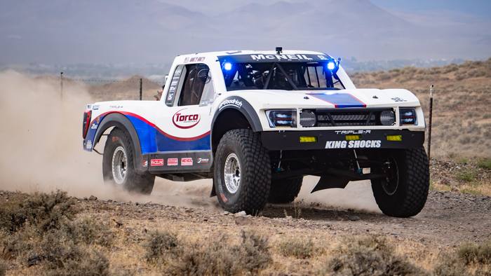 Unlimited Truck Legends race vehicle number L92 at speed, Kelly McNeil