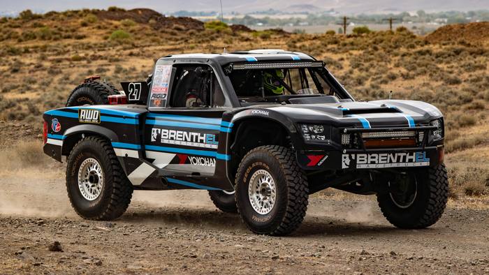 Unlimited Truck (4WD) race vehicle number 27 at speed, Jonathan Brenthel