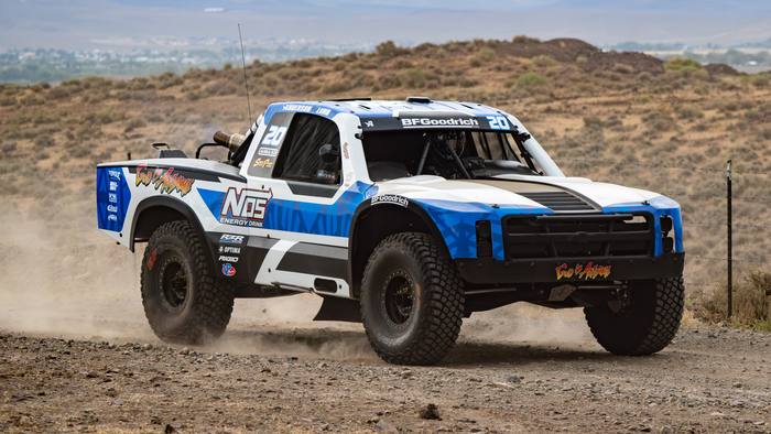 Unlimited Truck (4WD) race vehicle number 20 at speed, RJ Anderson