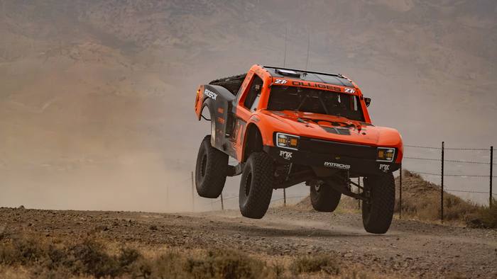 Unlimited Truck (2WD) race vehicle number 27T at speed, Steve Olliges