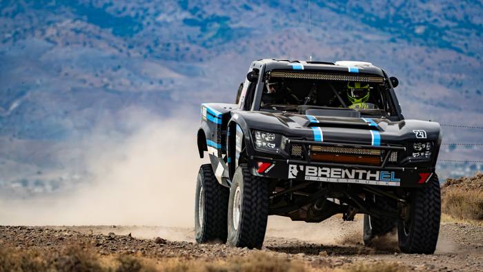 Unlimited Truck (4WD) race vehicle number 27 at speed, Jonathan Brenthel