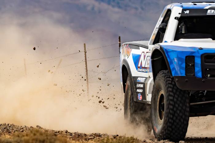 Unlimited Truck (4WD) race vehicle number 20 at speed, RJ Anderson