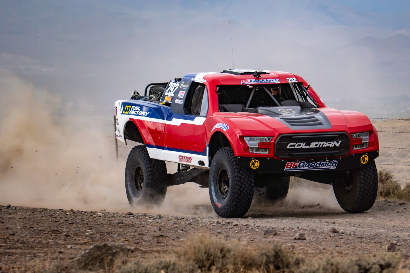 Unlimited Truck SPEC race vehicle number 292 at speed, Jason Coleman