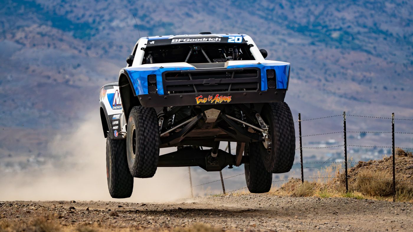 Unlimited Truck (4WD) race vehicle number 20 at speed, RJ Anderson